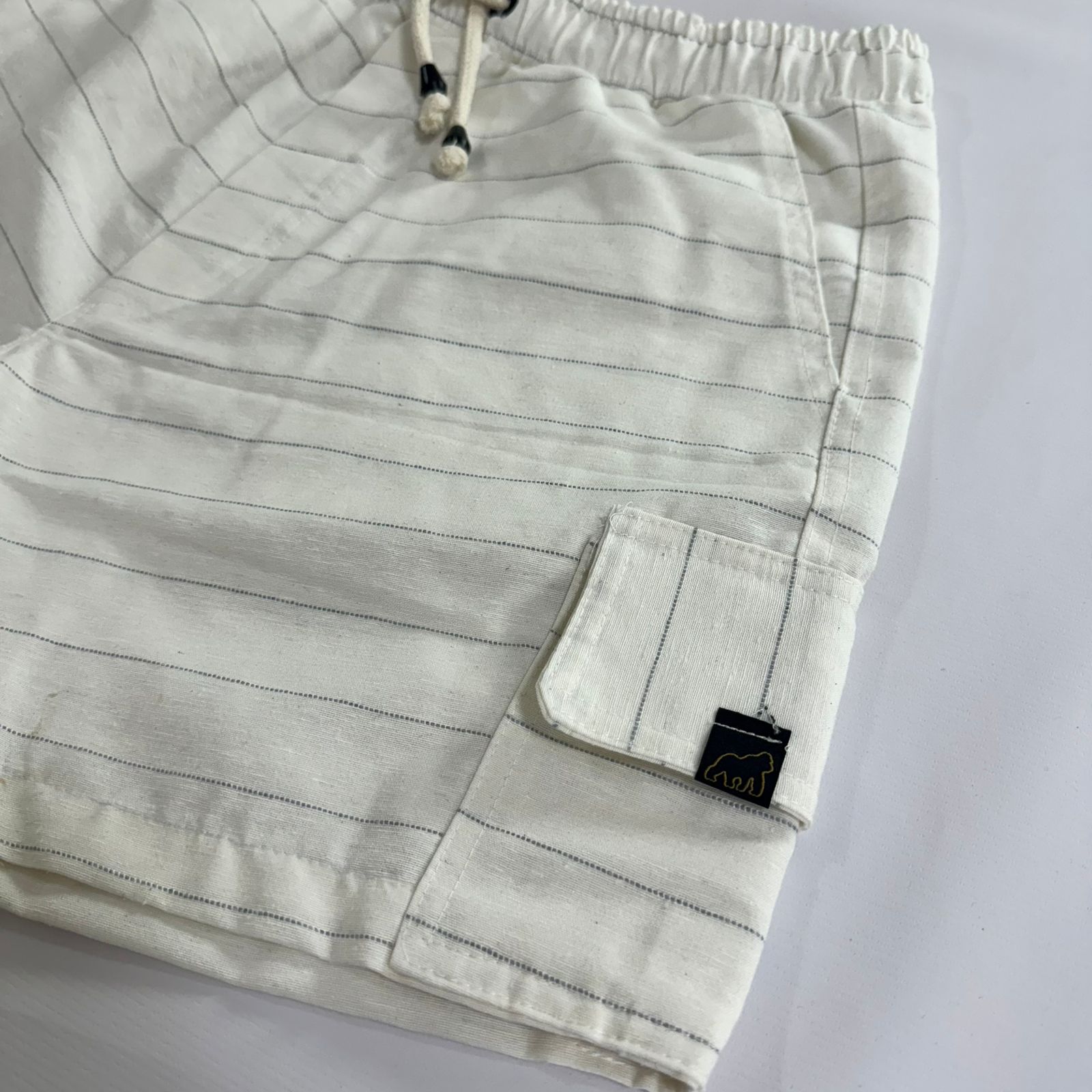 SHORT LINHO CARGO OFF LISTRADO